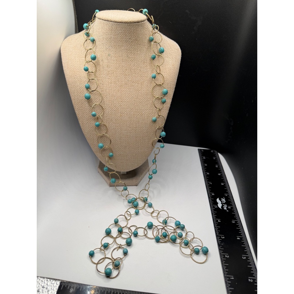 Anne Klein Gold Tone Turquoise Bead Long Statement Necklace Lion Logo Charm